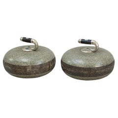 A Pair Of Engraved Curling Stones