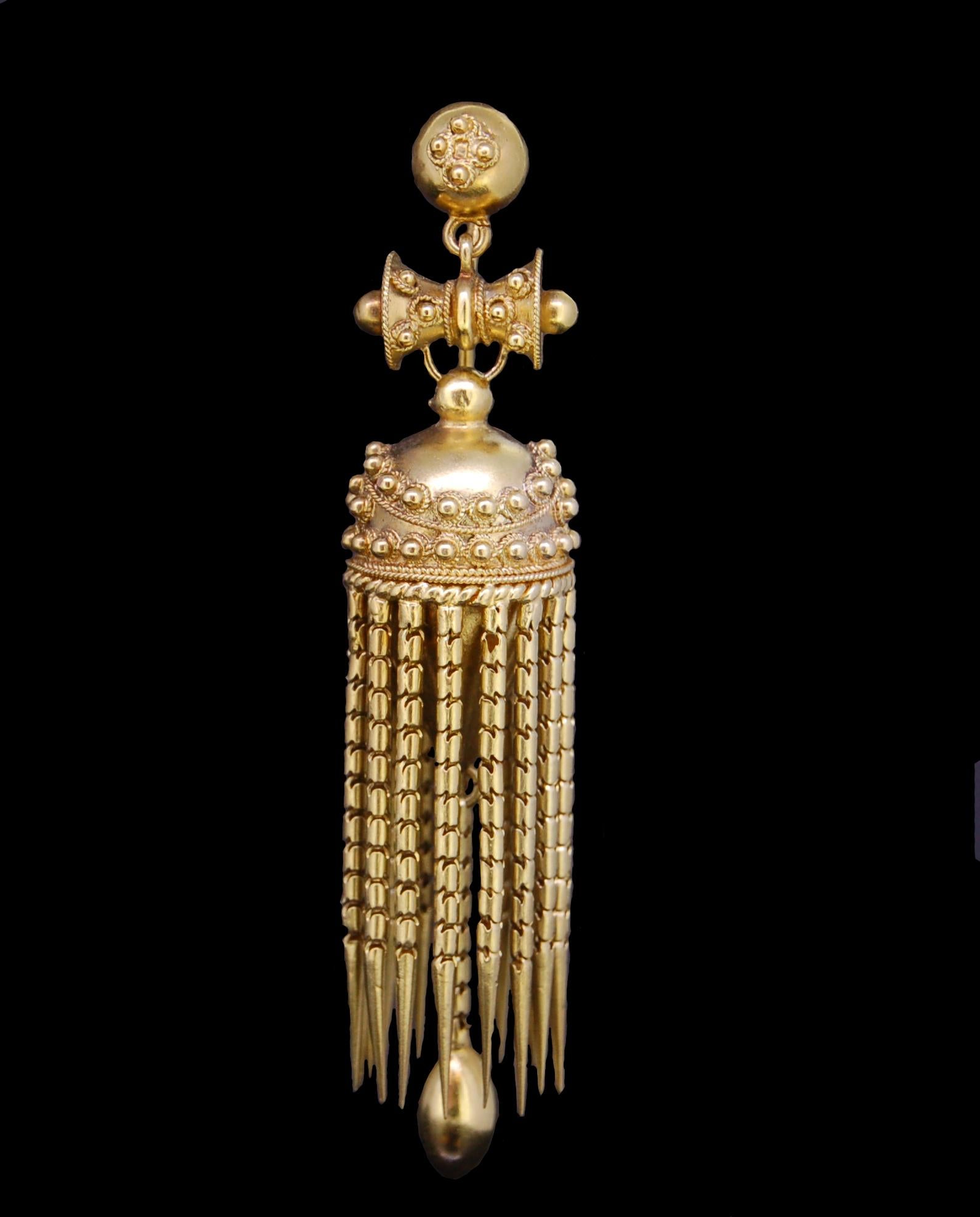 A PAIR OF ETRUSCAN STYLE PENDENT EARRINGS, CIRCA 1870, Each torpedo-shaped drop applied with bead and ropework details, issuing a fringe of snake-link tassels, to an articulated surmount. L. 6 cm. 14 grams. With a fitted case.