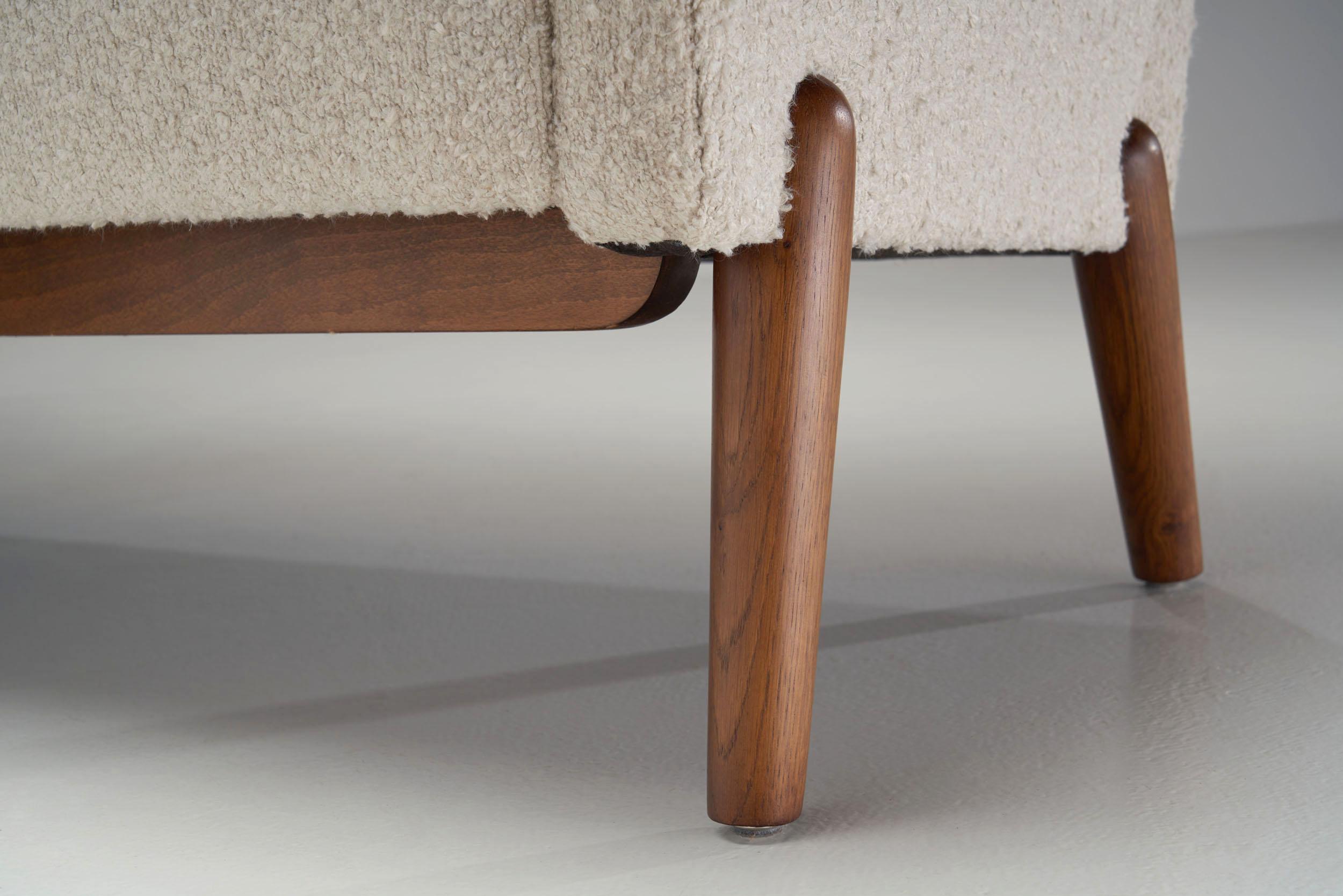 A Pair of Eva and Nils Koppel Three-Seater 