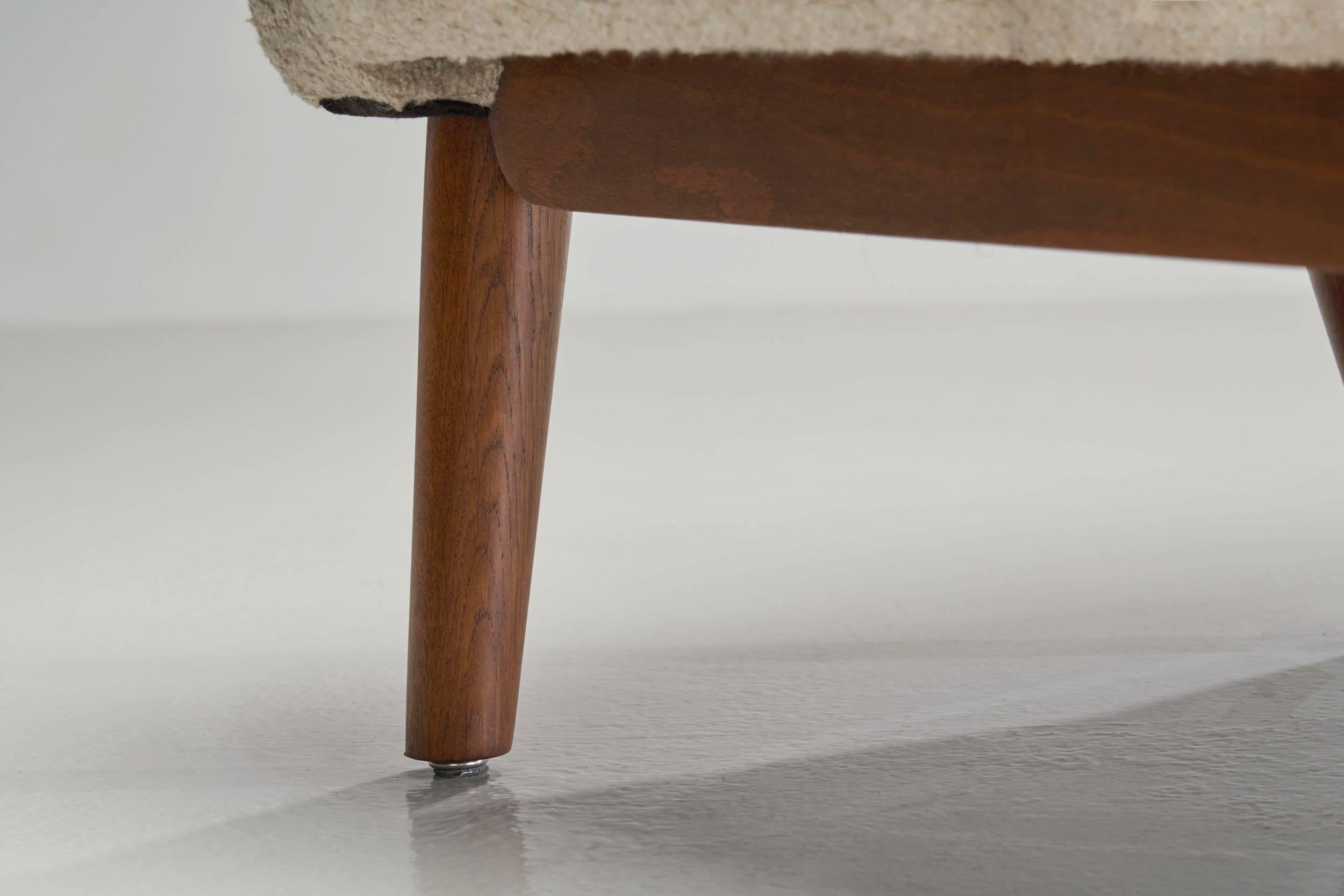 A Pair of Eva and Nils Koppel Three-Seater 