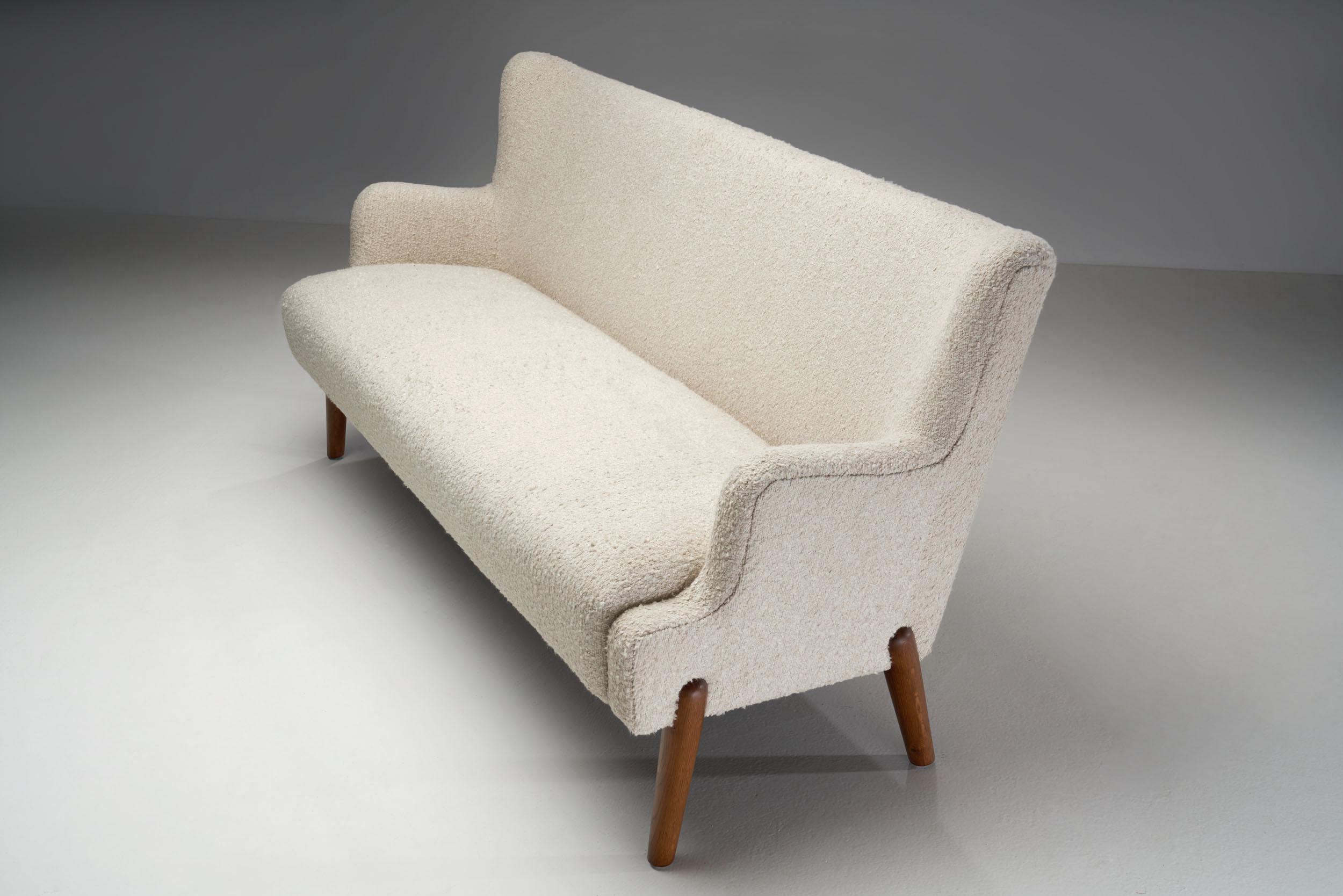 A Pair of Eva and Nils Koppel Three-Seater 