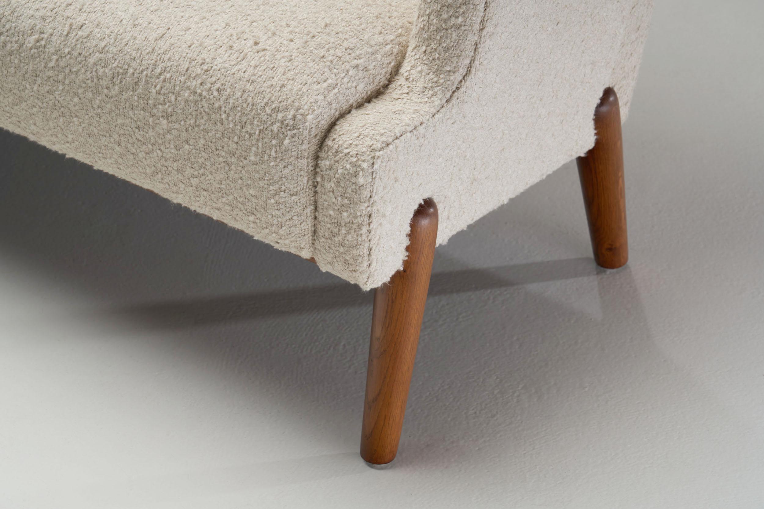 A Pair of Eva and Nils Koppel Three-Seater 