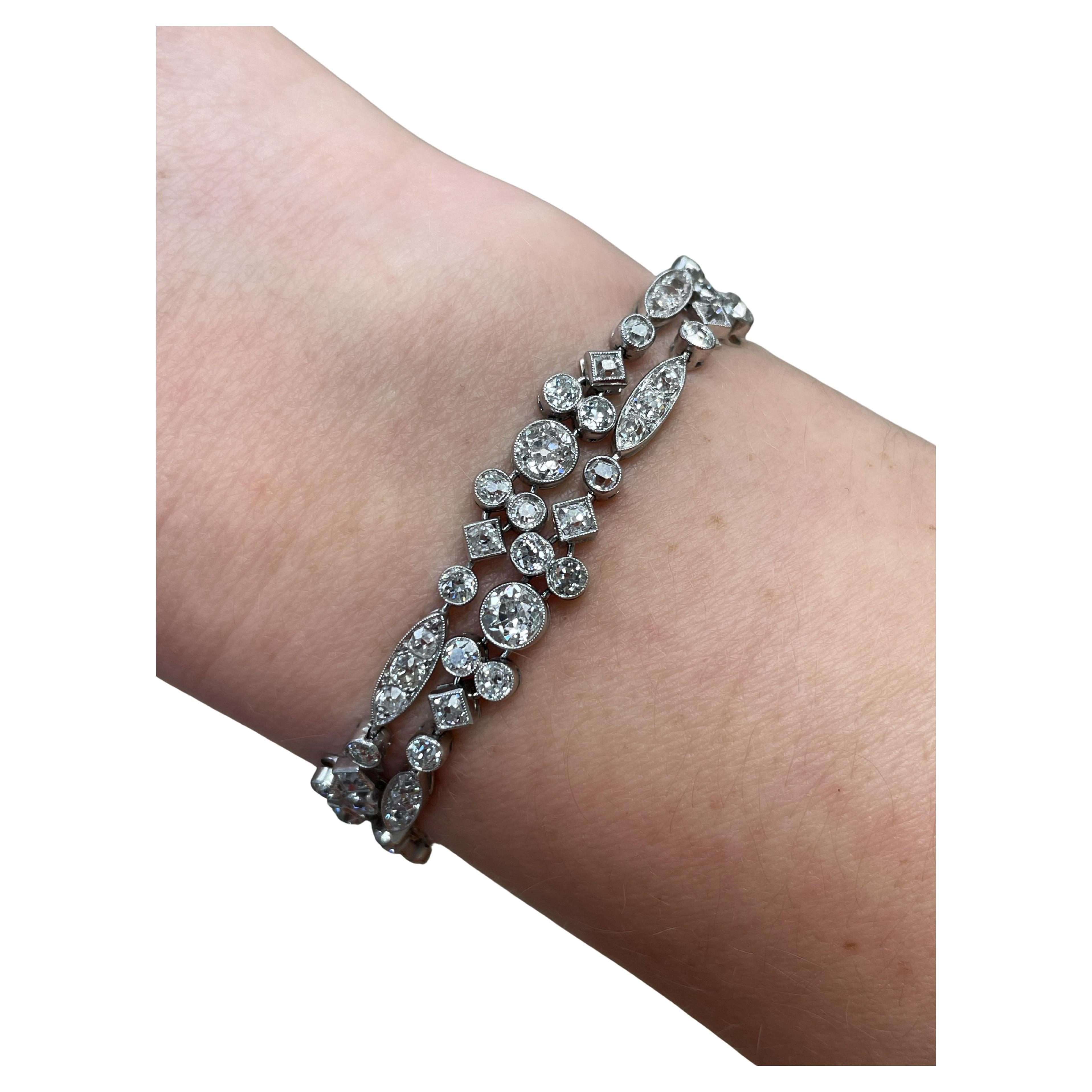 A Pair of Exceptional Cartier Art Deco Diamond Bracelets For Sale