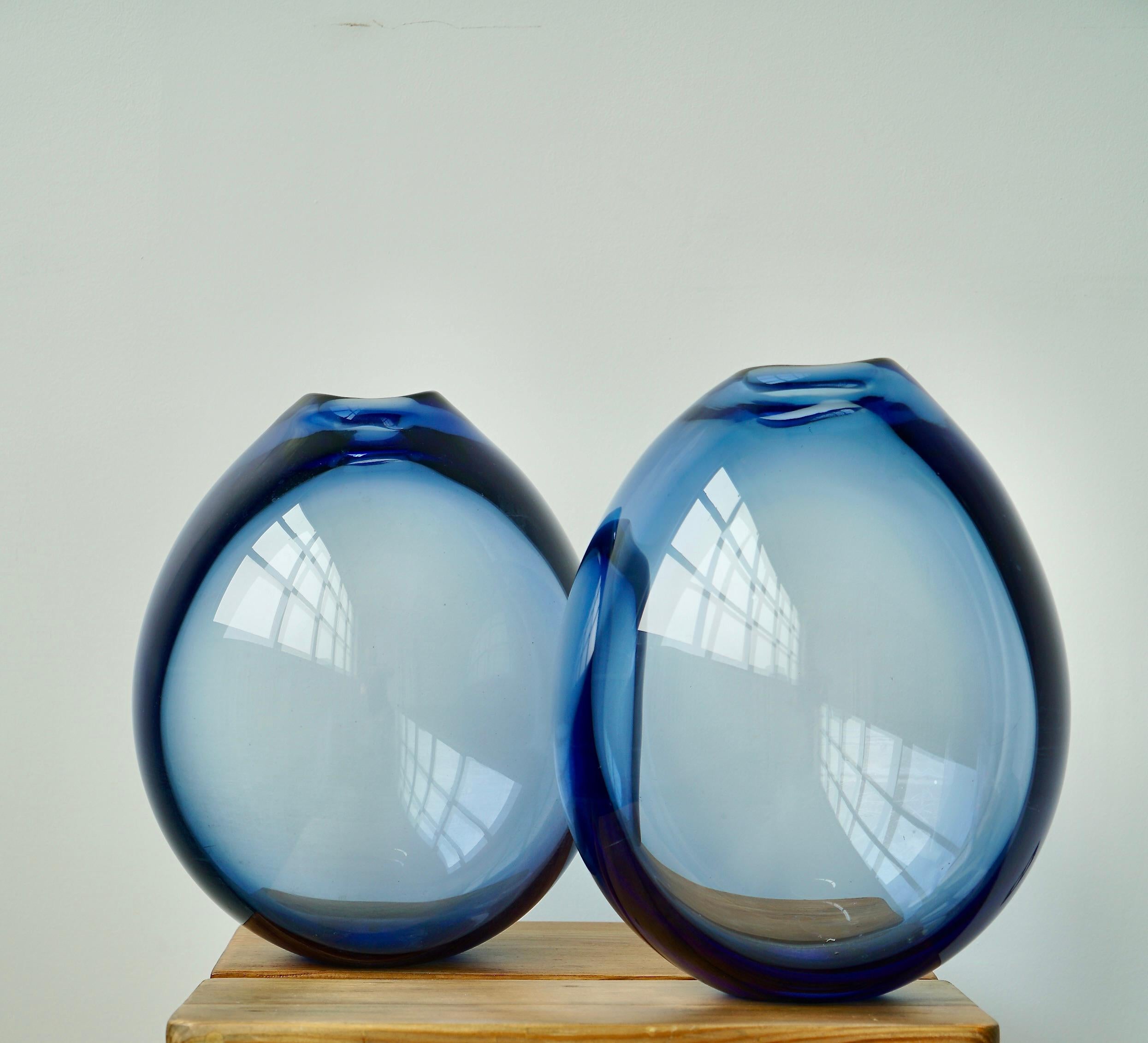 A pair of extra large hand blown glass vases by Per Lutken for Holmegaard, Denmark , Circa 1960th.
One vases signed and dated. Dimensions : H 15.75