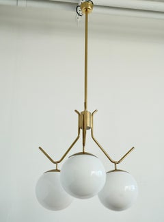 A Pair of Extra Large lightings by Pavo Tynell