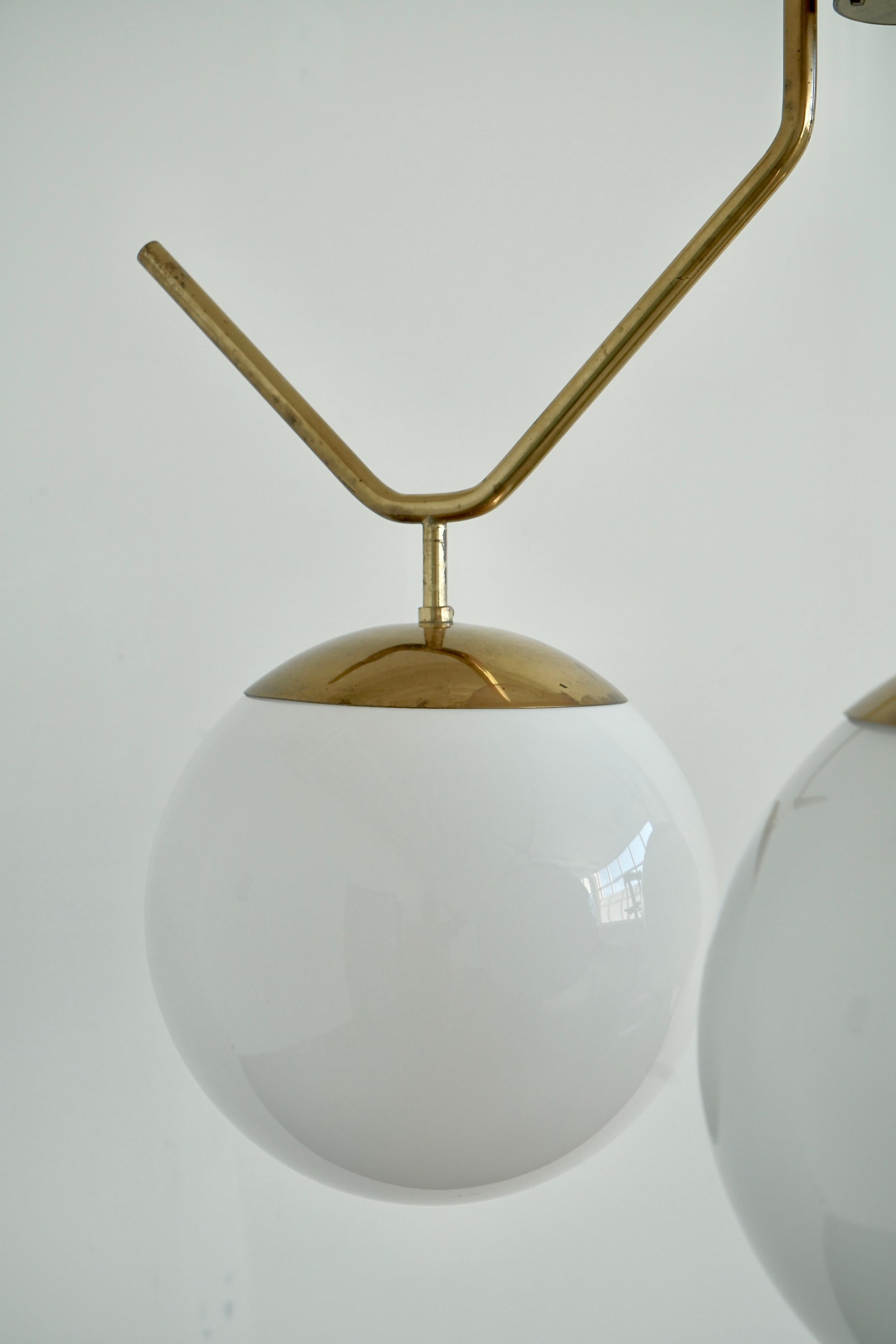 A Pair of Extra Large lightings by Pavo Tynell In Good Condition For Sale In Long Island City, NY