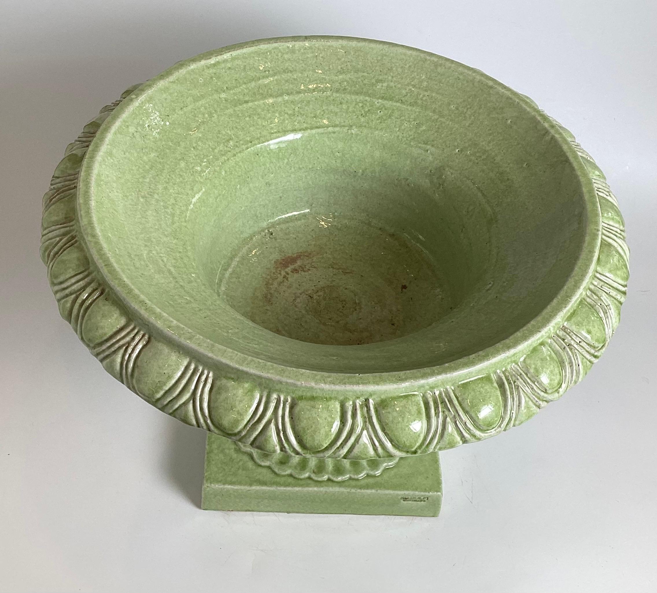 Neoclassical A Pair of Faience Green Italian Urns, retailed by Bergdorf Goodman For Sale