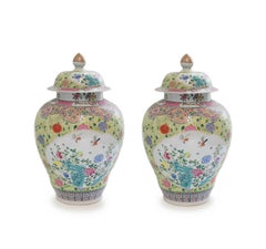 Pair of Famille Rose Porcelain Vases with Covers
