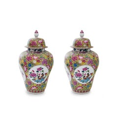 Pair of Famille Rose Porcelain Vases with Covers
