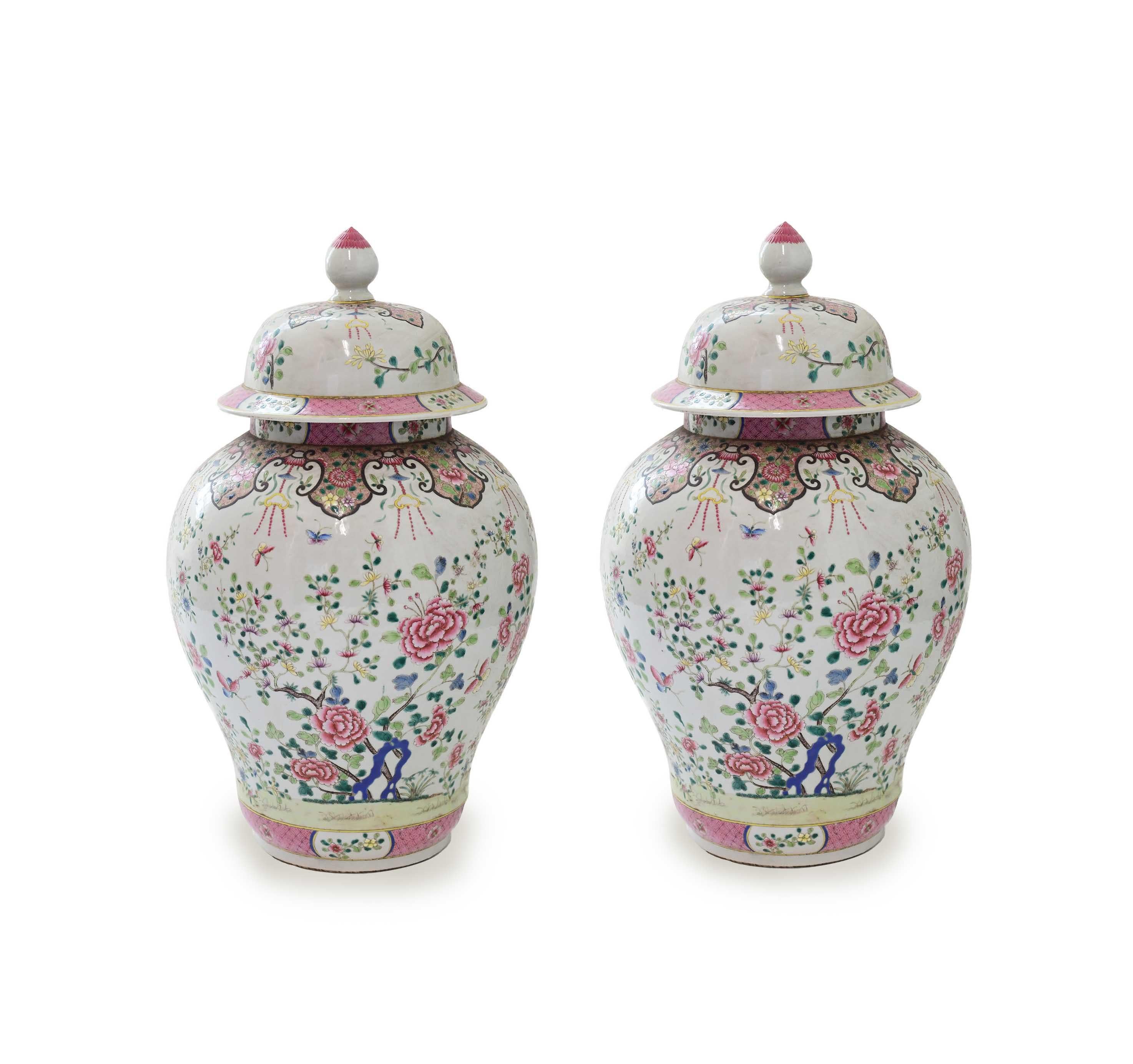 Fine painted porcelain vases with flowers bloom decoration.