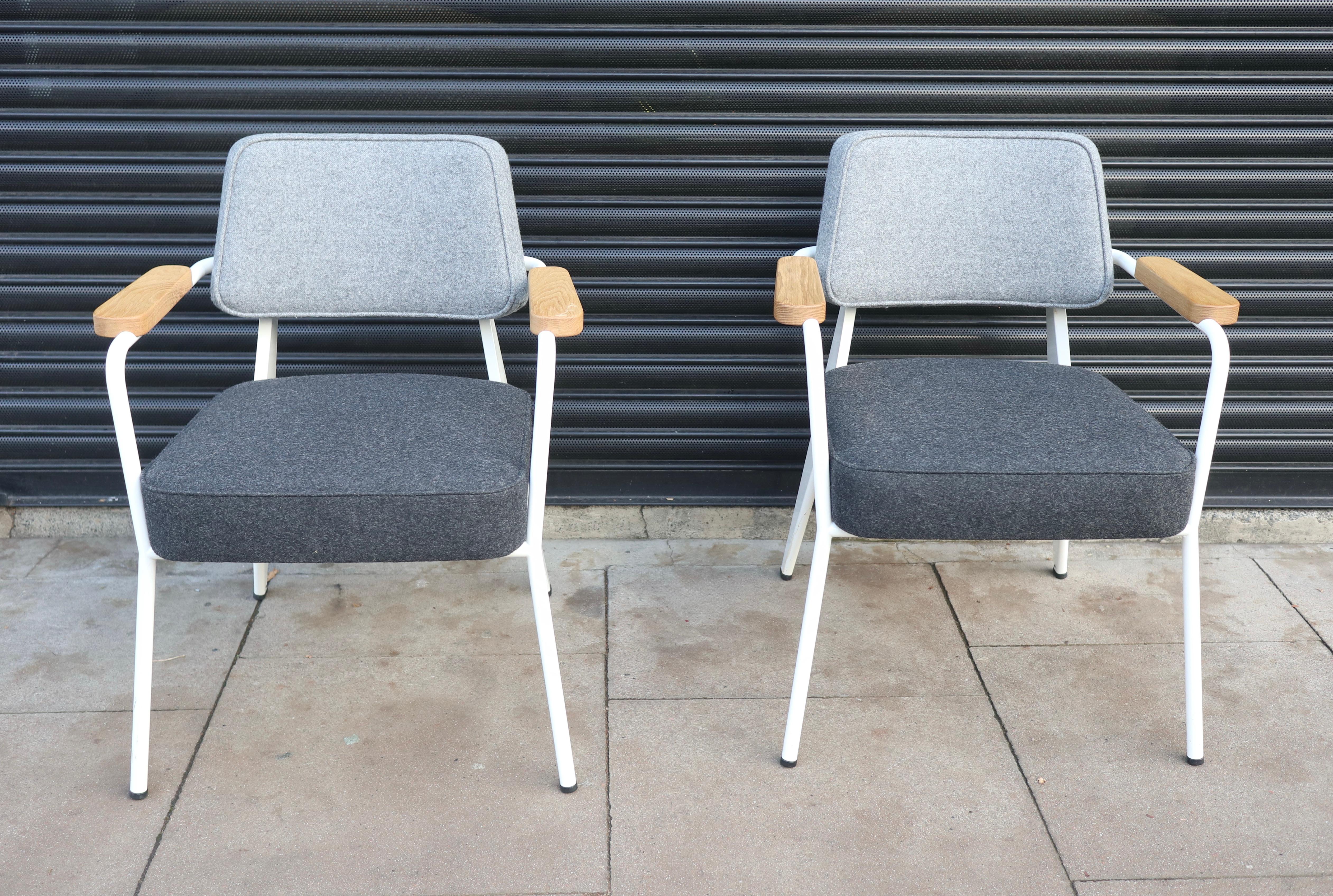 Elevate your dining experience with this pair of exquisite Fauteuil Direction carvers designed by Jean Prouvé for VITRA. Crafted in Switzerland, these chairs boast a stunning grey colour and are made of 100% wool upholstery fabric. With a length of