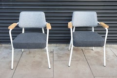 A pair of Fauteuil Direction carvers by Jean Prouvé for VITRA