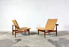 Un par de tumbonas FD137 Japan diseñadas por Finn Juhl