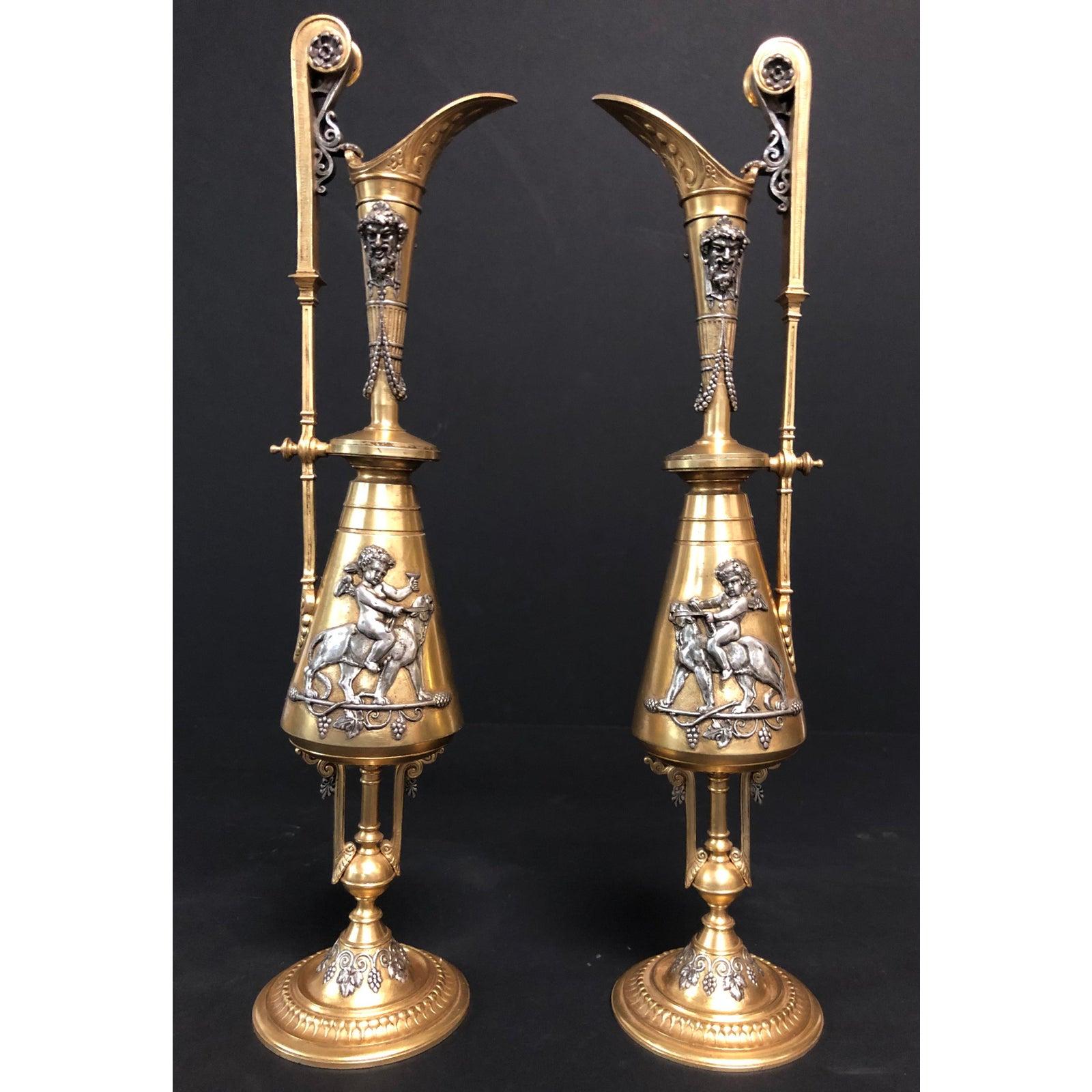 Gold Plate Pair Of Gilt and Silvered Figural Bronze Urns For Sale