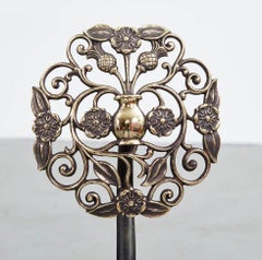 A Pair of Filigree Brass Rosette Andirons