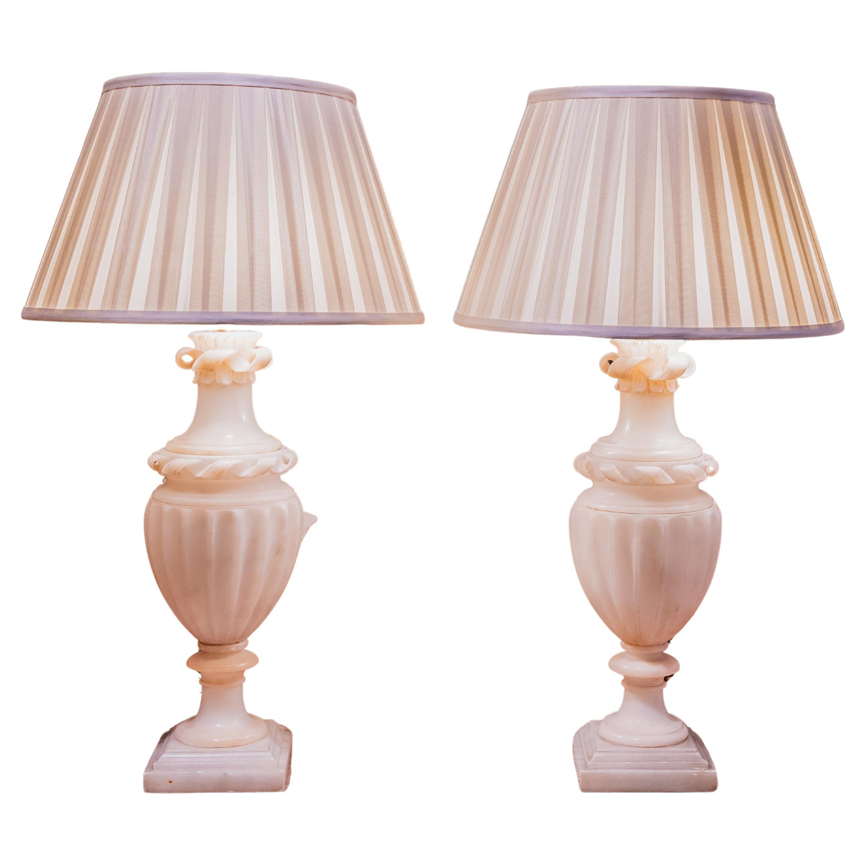 A pair of fine 19th century Italian alabaster carved lamps