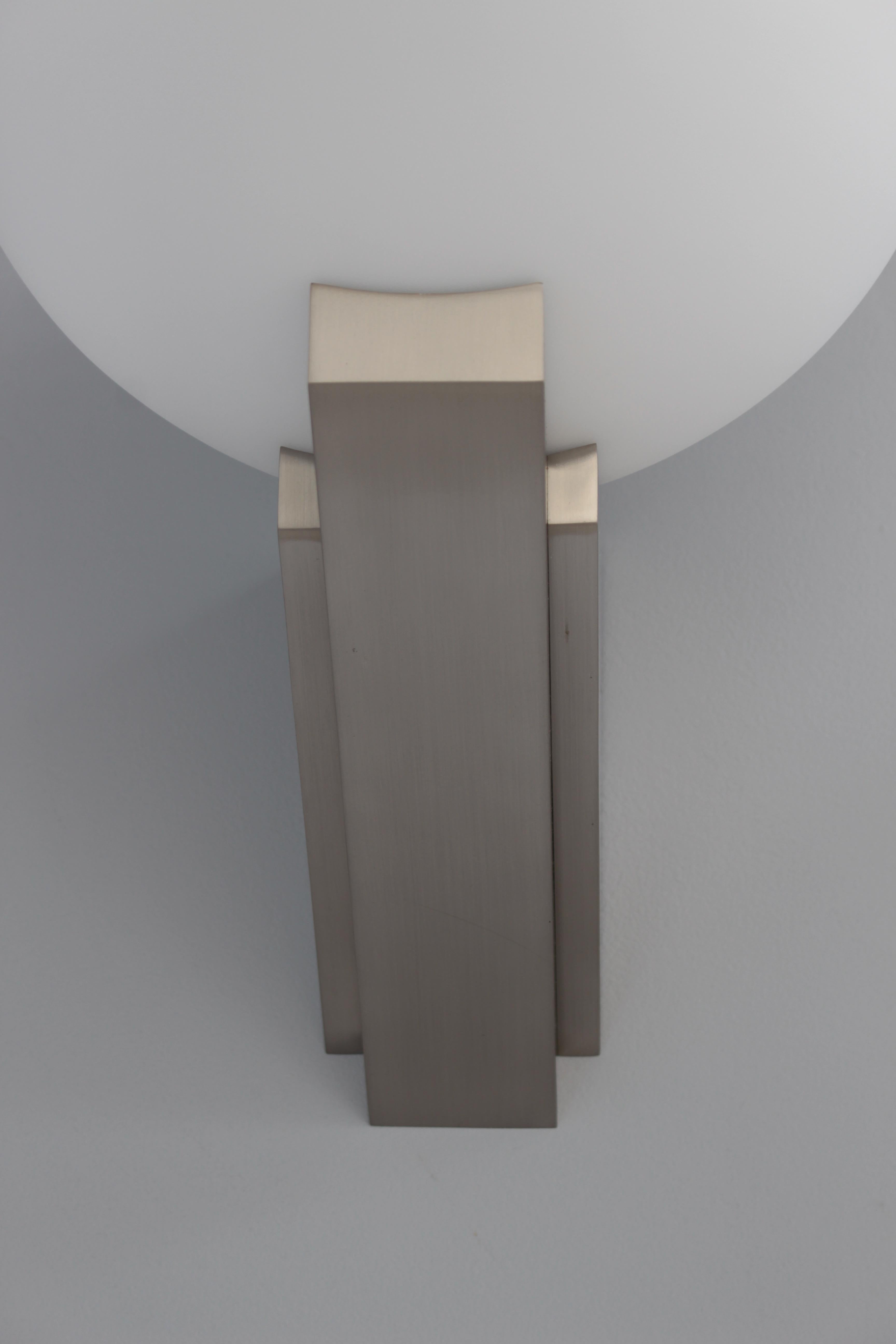 A pair of Fine French Art Deco Brushed Nickel and Glass Sconces by Jean Perzel For Sale 8