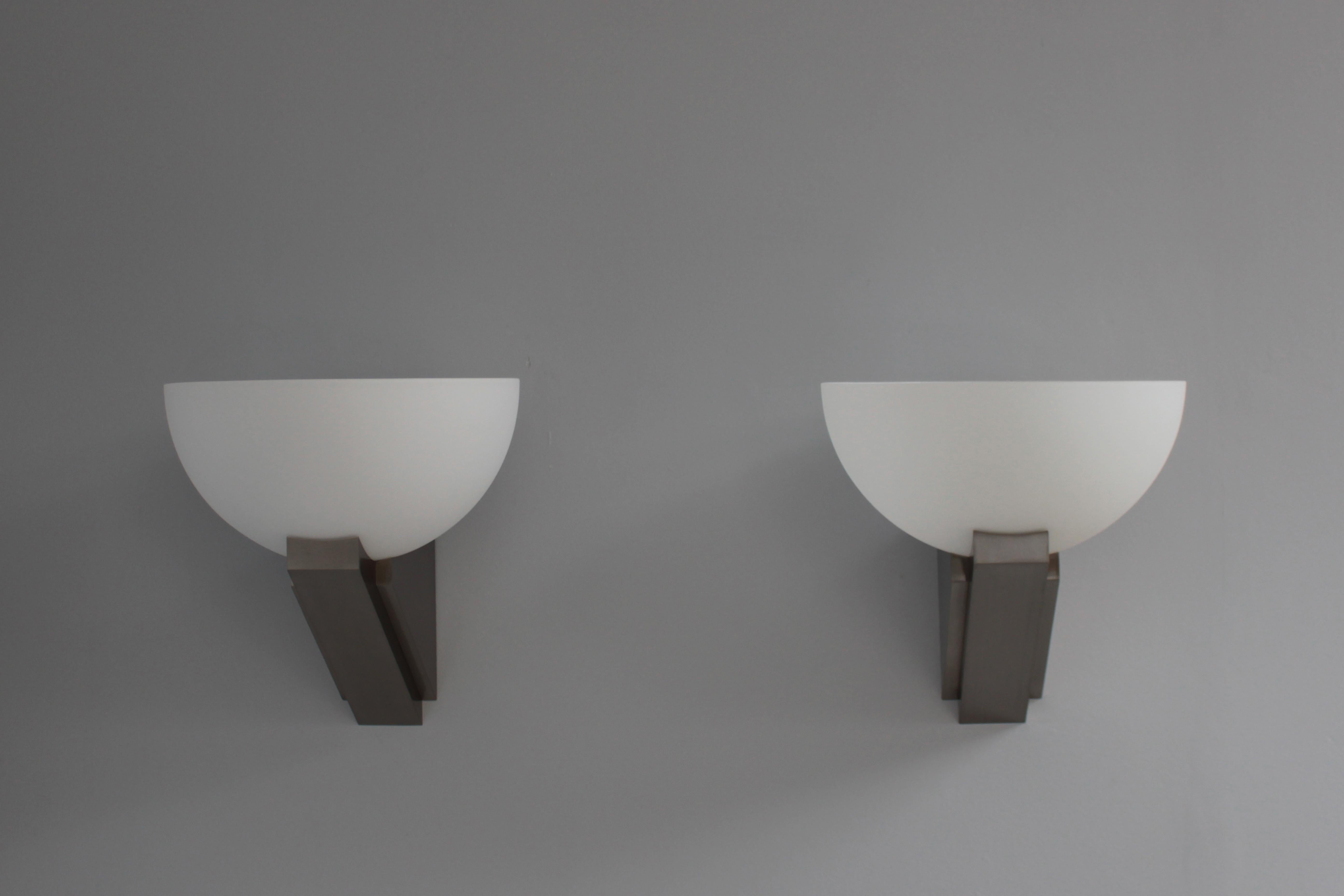Mid-20th Century A pair of Fine French Art Deco Brushed Nickel and Glass Sconces by Jean Perzel For Sale