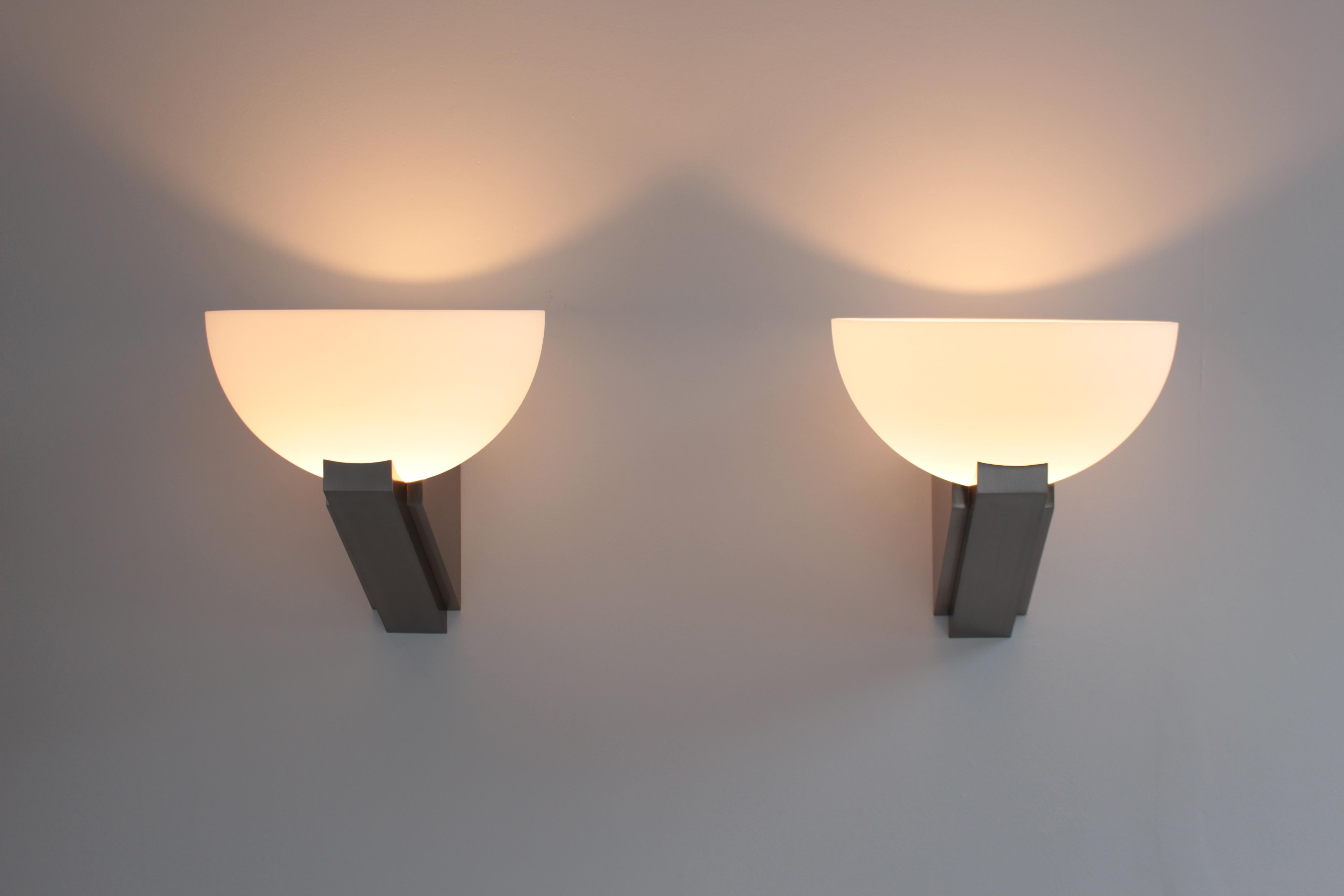 A pair of Fine French Art Deco Brushed Nickel and Glass Sconces by Jean Perzel For Sale 1