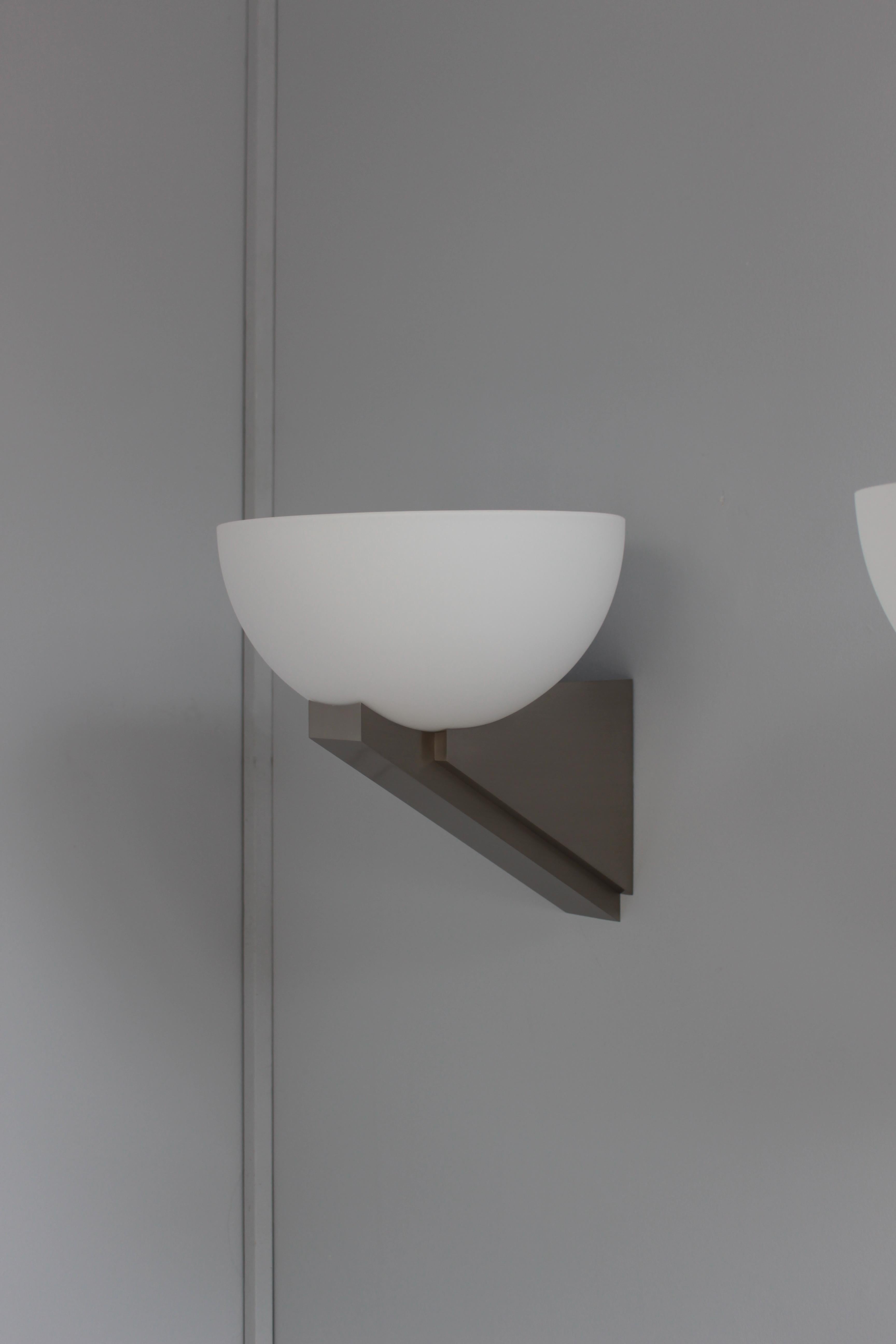 A pair of Fine French Art Deco Brushed Nickel and Glass Sconces by Jean Perzel For Sale 4