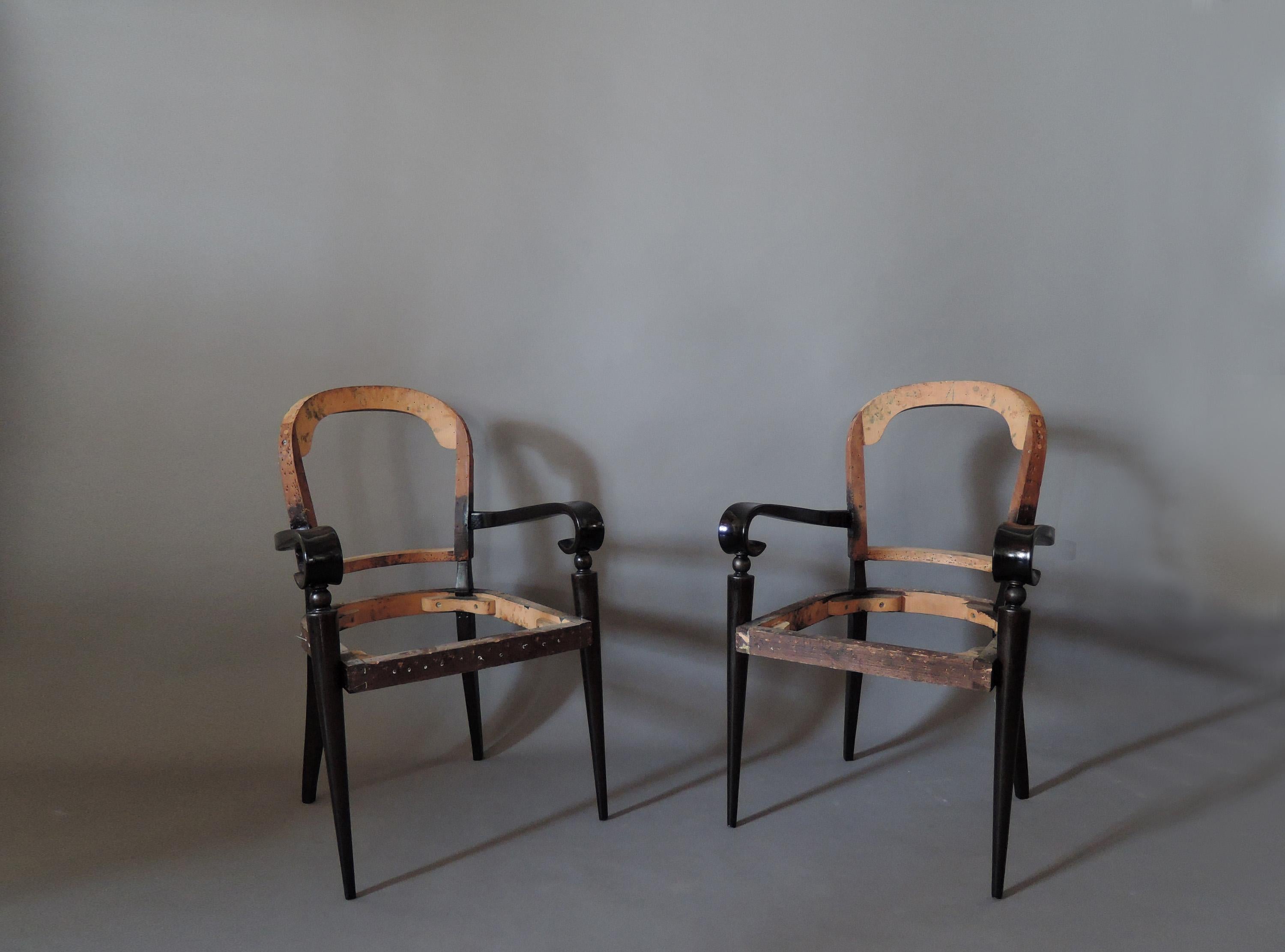 Mid-20th Century A Pair of Fine French Art Deco Ebonized Mahogany Arm Chairs by Maxime Old For Sale