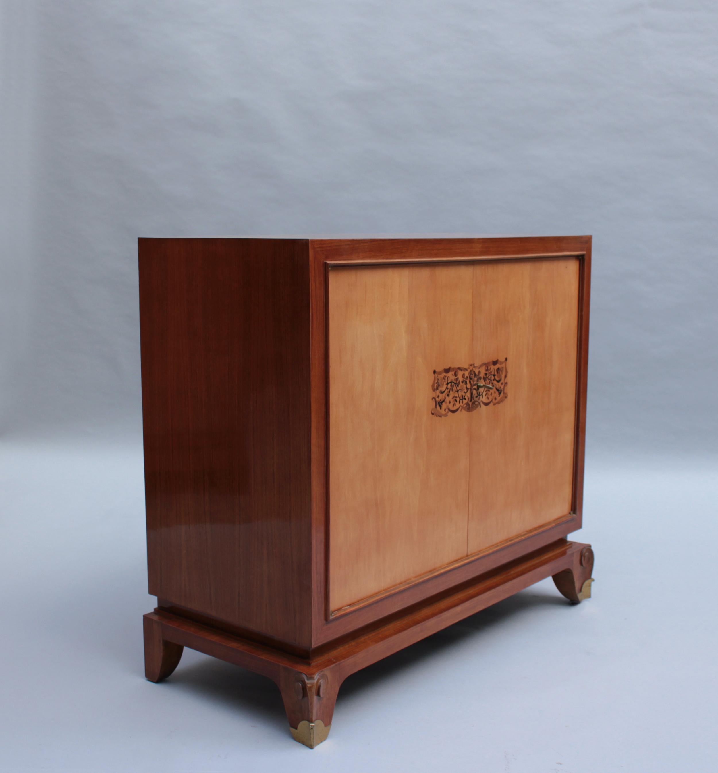 Paire de meubles de rangement/commodes Art Déco français en bois de rose par Jean Pascaud Bon état - En vente à Long Island City, NY