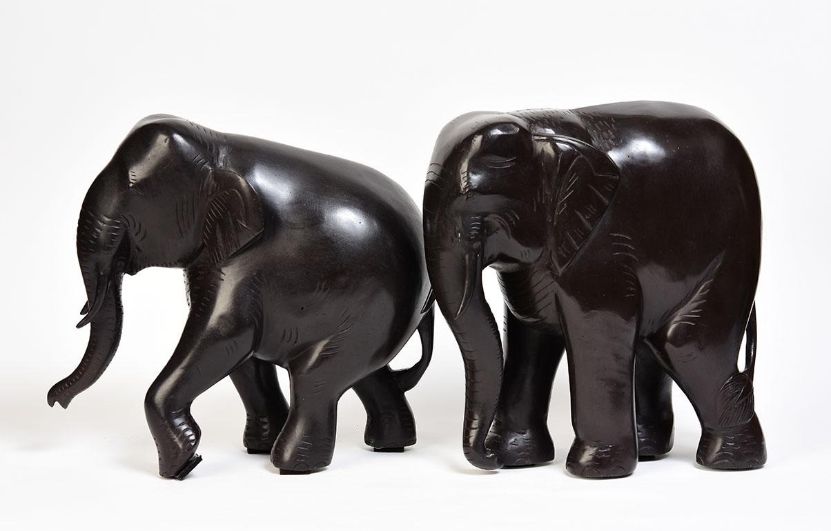 Southeast Asian Pair of Finely Cast Asian Bronze Walking Elephant Animal Statues For Sale