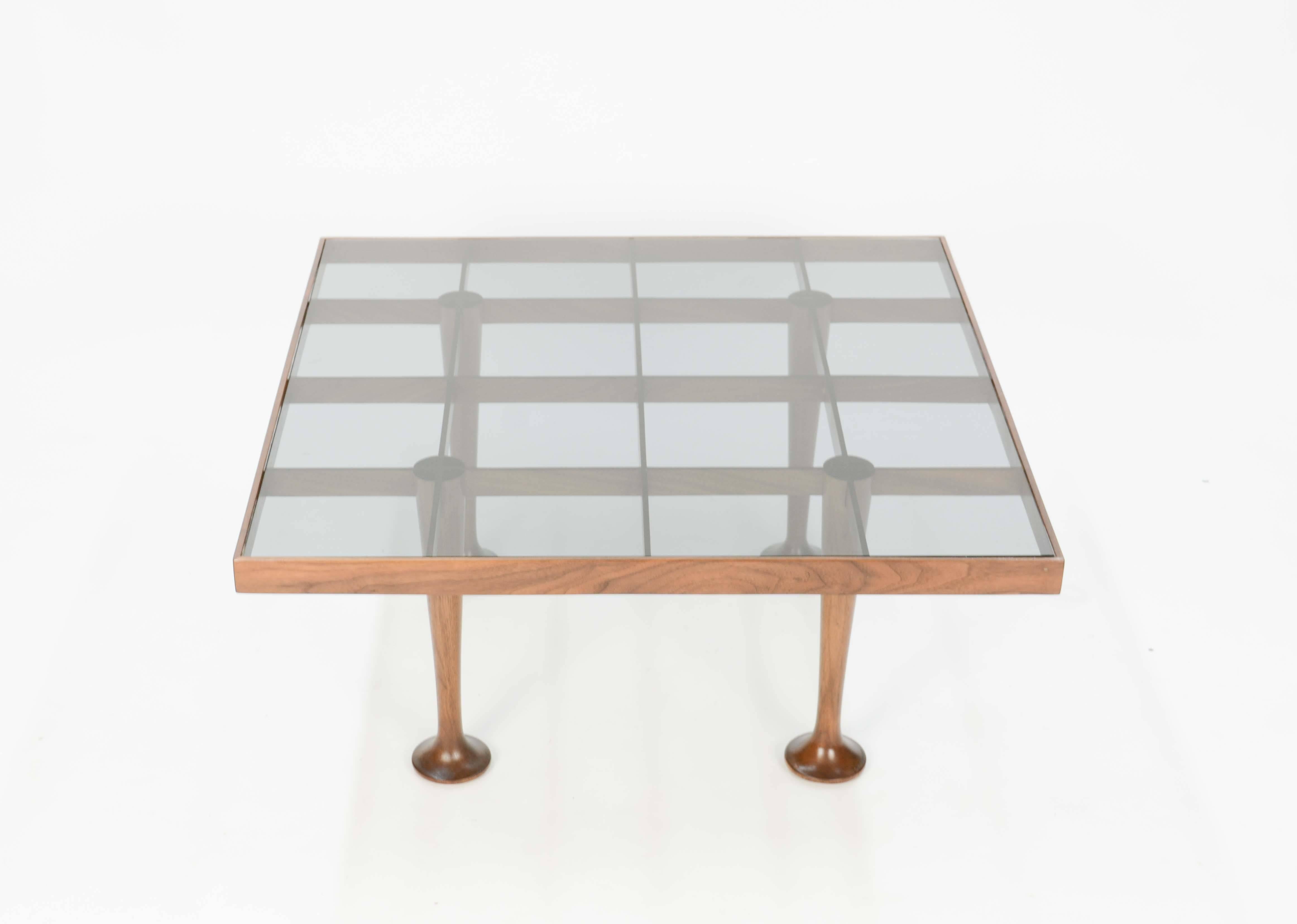 These Finely detailed pieces are from the Italain period of haute modern design period.  The tables are perfect for the living room or elegant bed side tables.  They can be put side by side and form  an extra long coffee table.  The smiked glass is