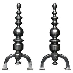 A Pair of Firedogs in Polished Steel