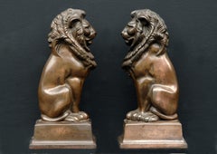 Pair of Firedogs with Lion Motif