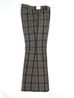 A pair of flared trousers in checked wool tweed – France, circa 1972