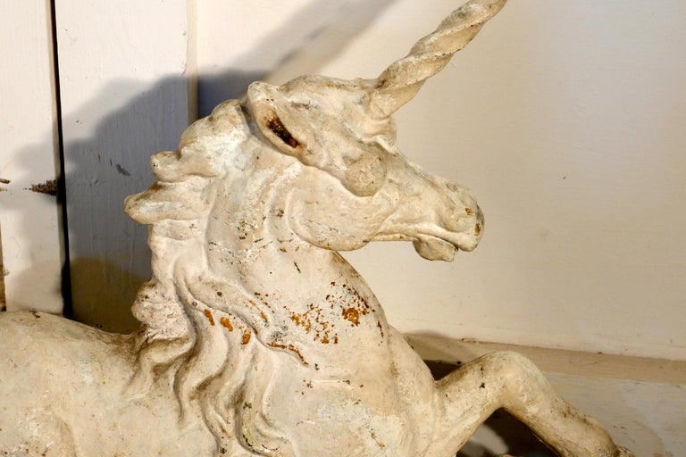 Pair of Flat Back Cast Iron Lion and Unicorn Garden Ornament Figures at