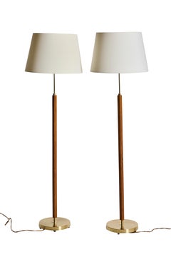 A pair of floor lamps by Falkenbergs Belysning, Rosewood and Brass, 60s