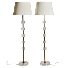 A pair of floor lamps, glass and brass, by Carl Fagerlund for Orrefors, 1960s