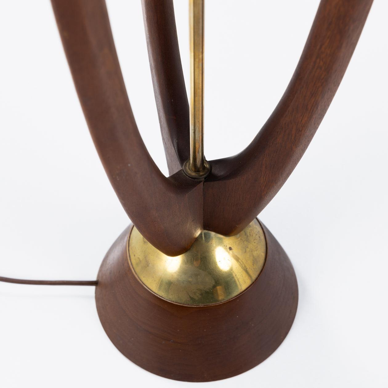 Patinated A pair of floor lamps in walnut by John Keal For Sale