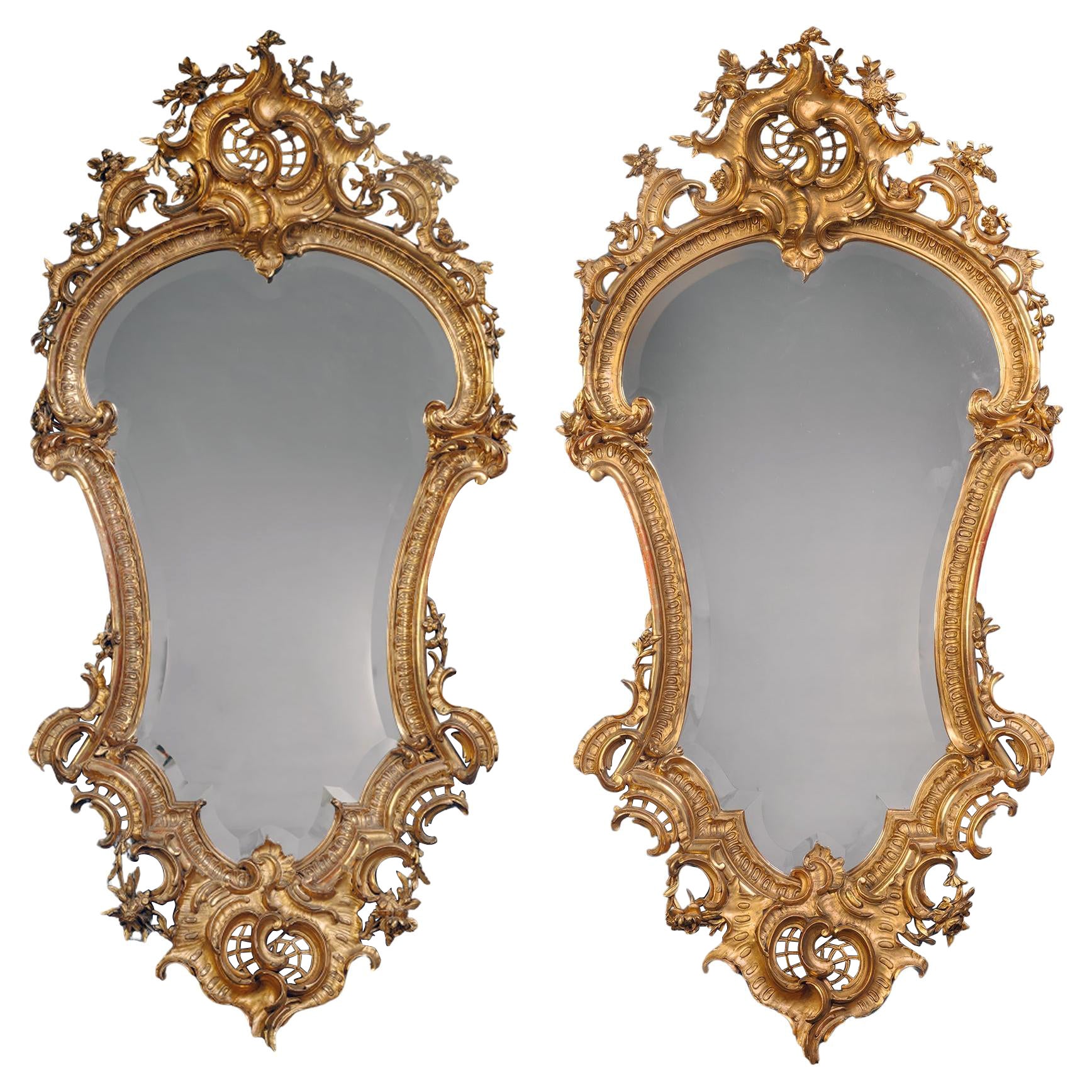 A Pair of Florentine Cartouche-Shaped Giltwood Wall Mirrors For Sale