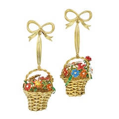A pair of flower basket earrings made by Bentley & Skinner