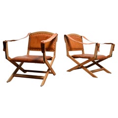 A Pair of Foldable Swedish Safari X-Chairs in Oak and Leather