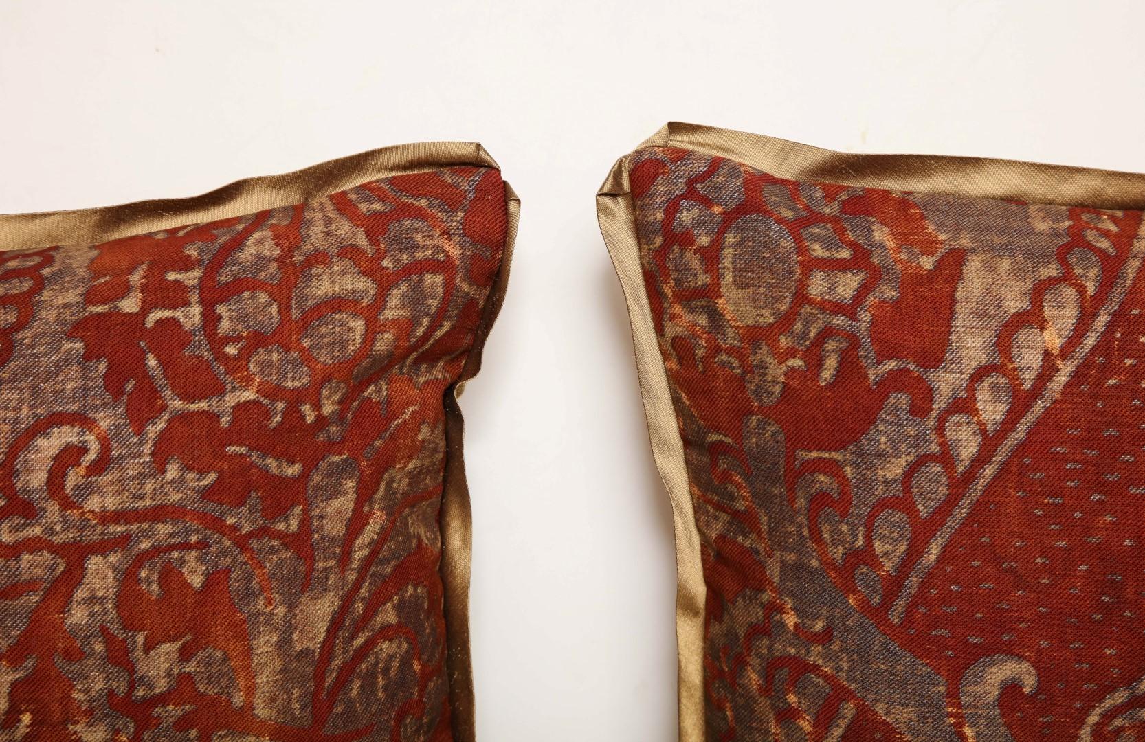 A pair of Fortuny fabric cushions, antique fabric with gold silk blend bias trim and backing material
50 down/50 feather insert
Newly made using discontinued Fortuny fabric.