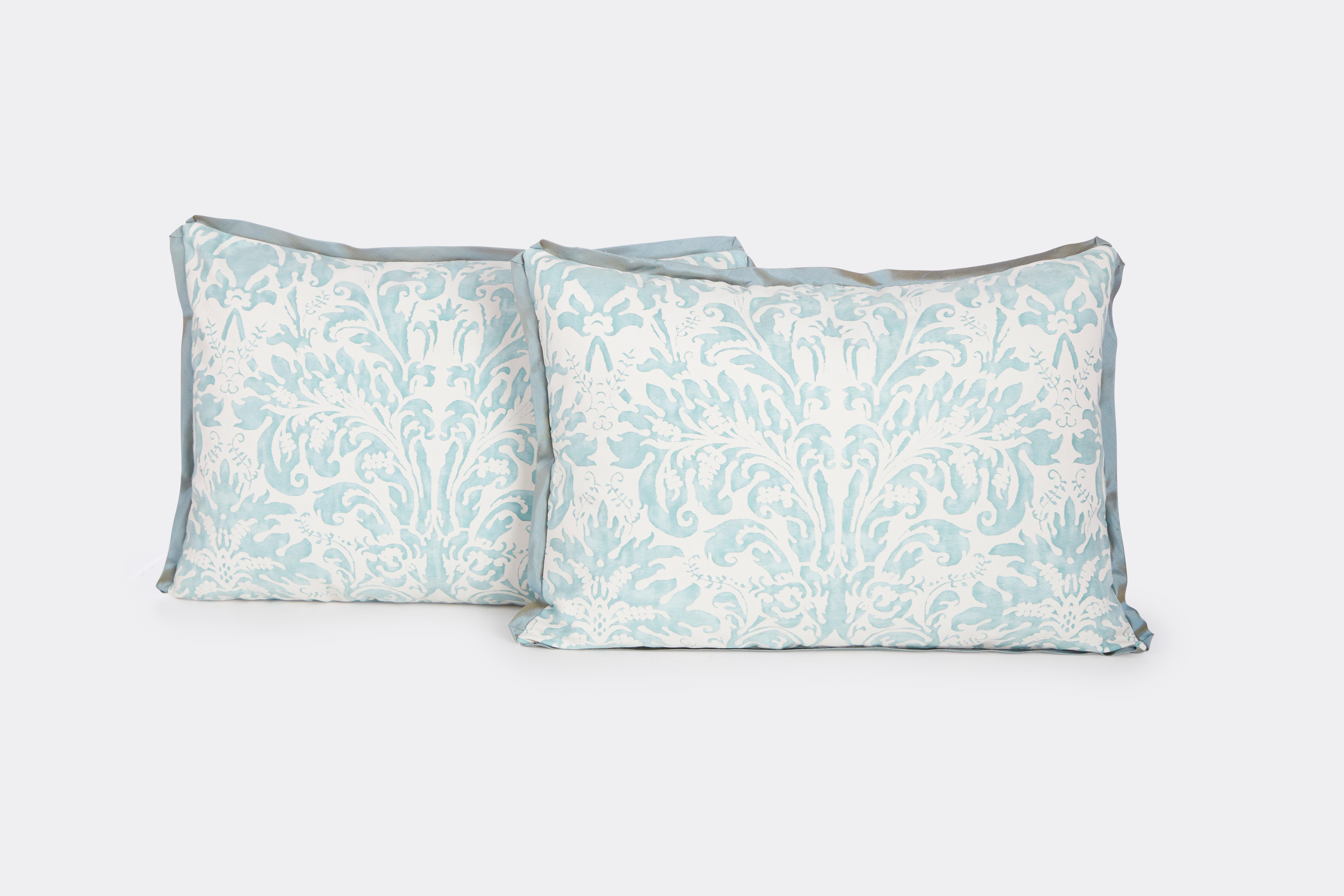 A pair of Fortuny Sevigne cushions in French Blue and antique white with blue bias silk edging and cashmere flannel backs.
50 down/50 feather insert.
All sales are final 