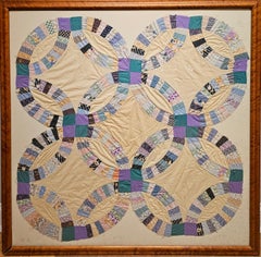 A Pair of Framed Early 20th Century American Double Wedding Ring Quilts