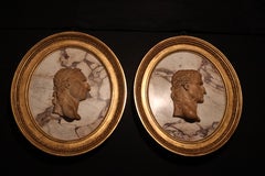 A Pair of Framed Marble Cameos of Roman Emperors