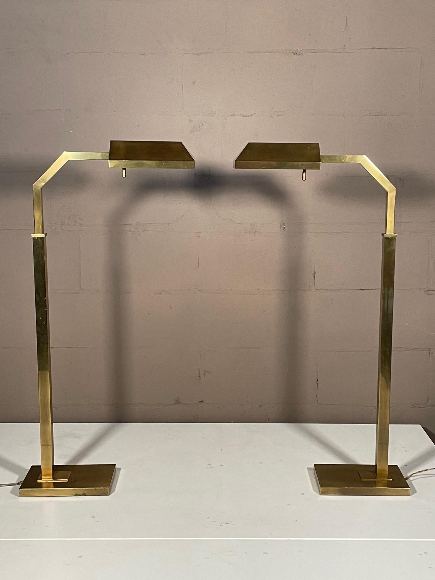 A pair of classic floor/reading lamps by Frederick Cooper, signed, Chicago, ca' 1980's. Shade height extends from 37.75
