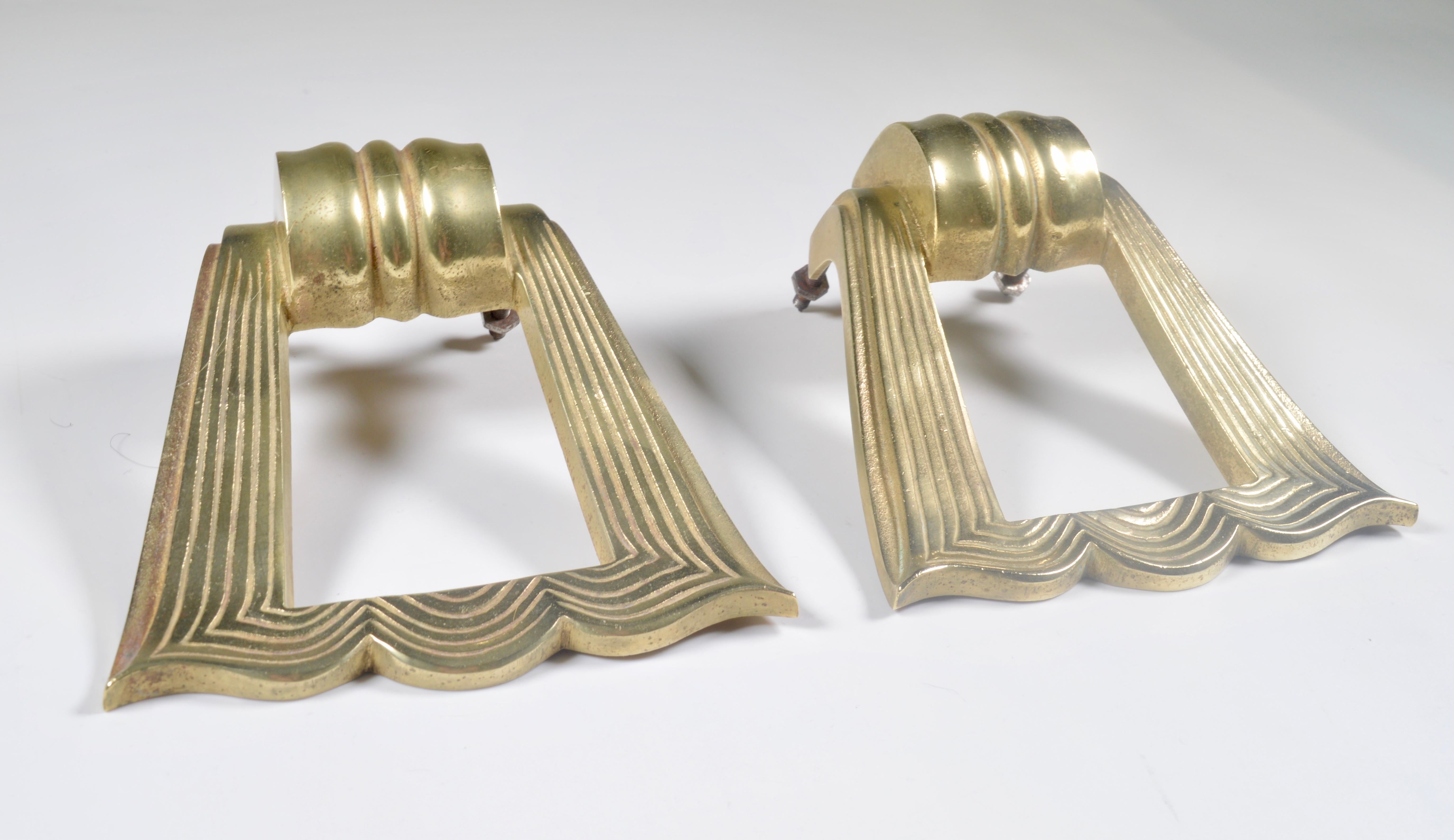 Very elegant large door pulls dating from the 1940s. They can be used on a front door or on interior doors.