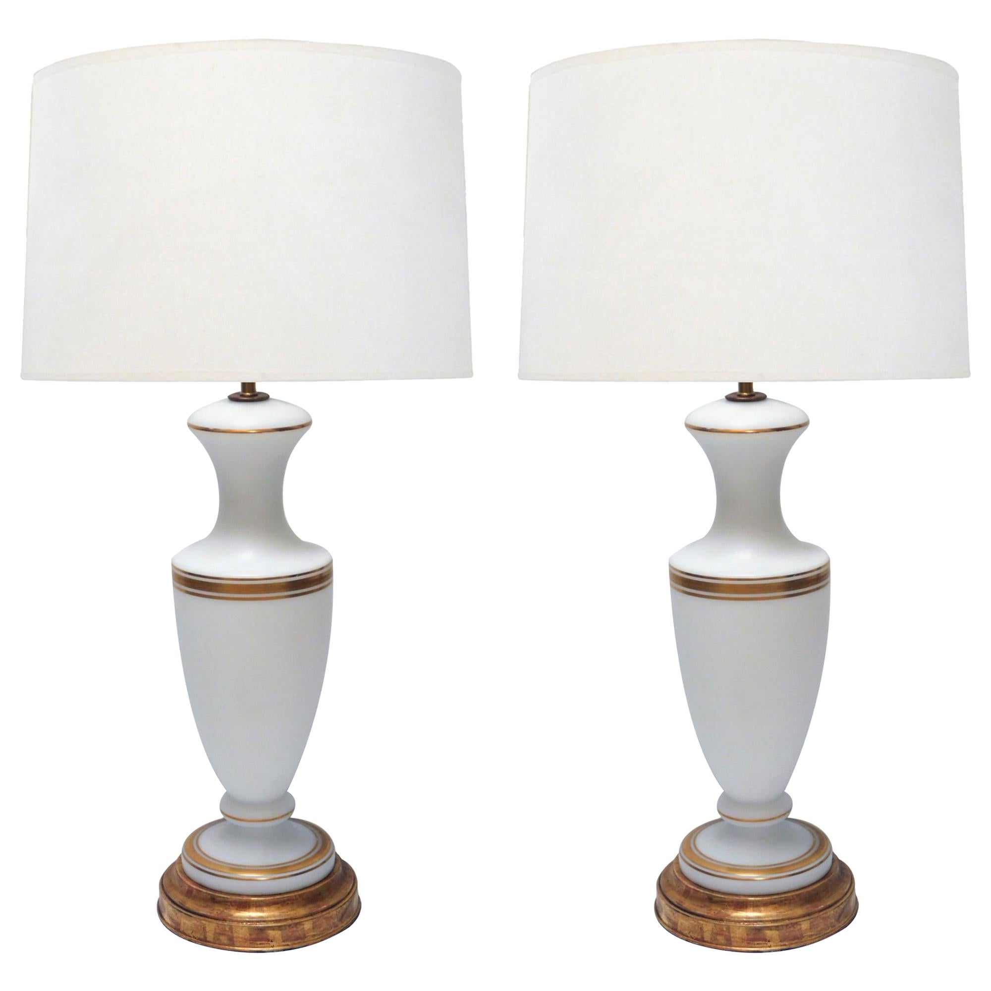 A Pair of French 1960's White Frosted Glass Lamps with Gilt Highlights