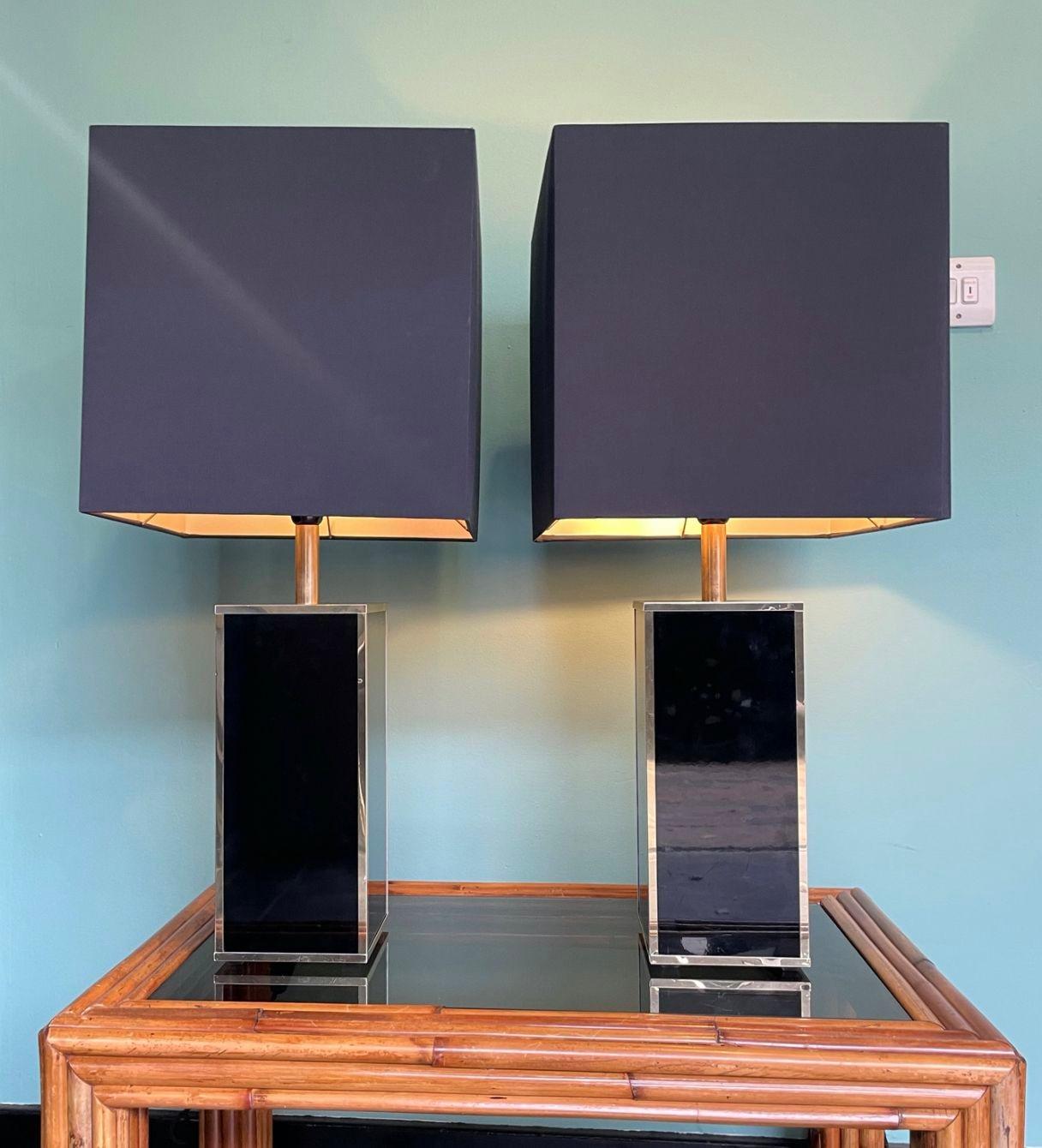 A pair of French 1970s black laminated and gilt metal lamps with new bespoke black shades. Re wired with new fittings, black cord flex and switch.