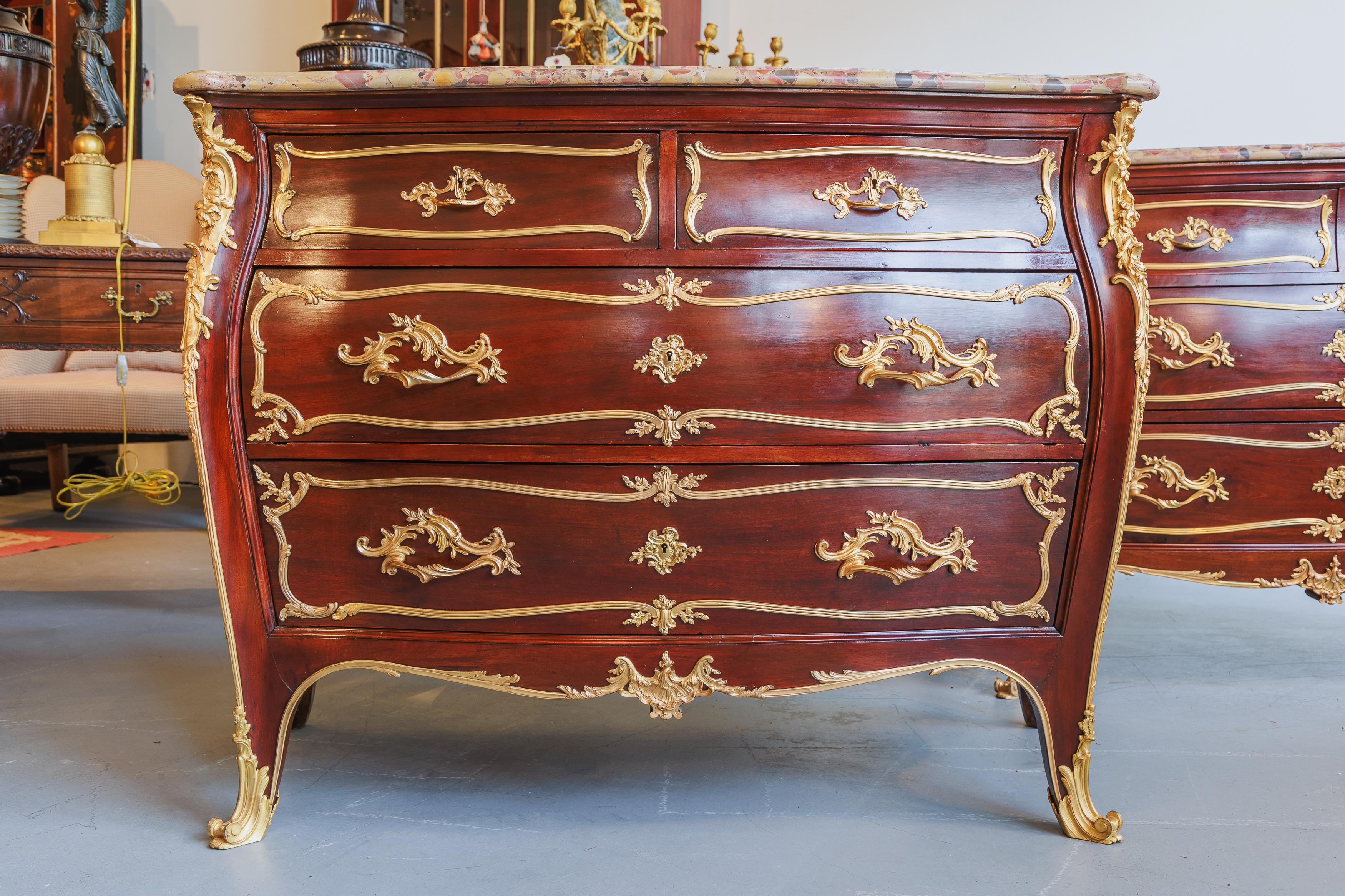 A fine and rare pair of late 19th century French mahogany and gilt bronze mounted mounted by F. Linke. The locks signed .
Original Breche D' Alep marble tops. ( Pictured in the 19th century book of French furniture by Christopher Payne with an