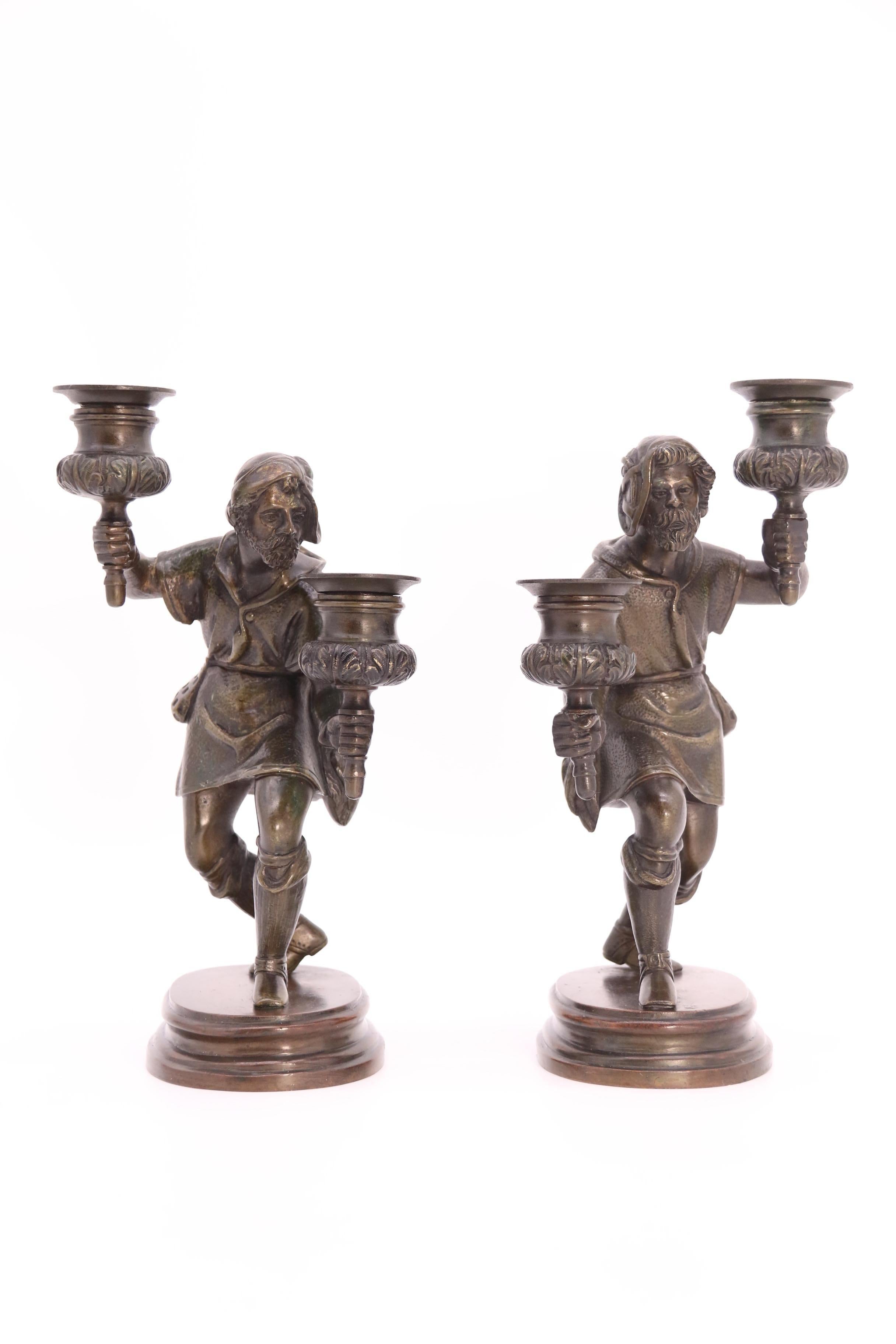 A pair of French 19th century bronze figurative double candlesticks circa 1860 In Good Condition For Sale In Central England, GB