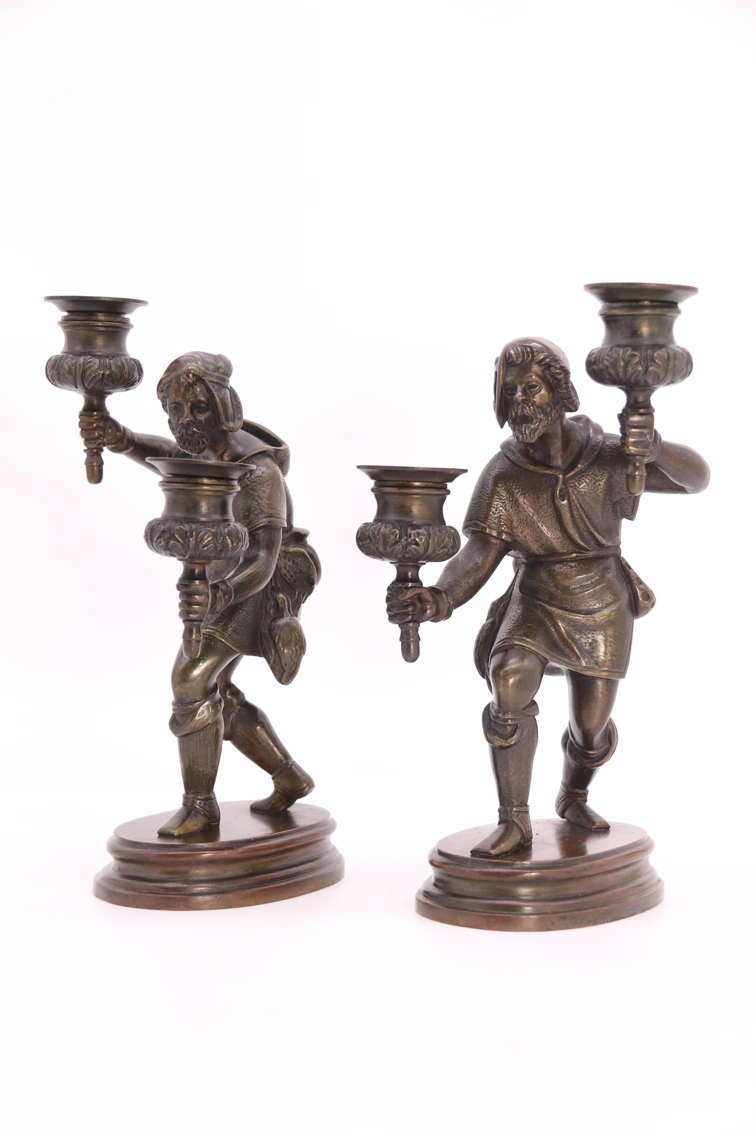 19th Century A pair of French 19th century bronze figurative double candlesticks circa 1860 For Sale