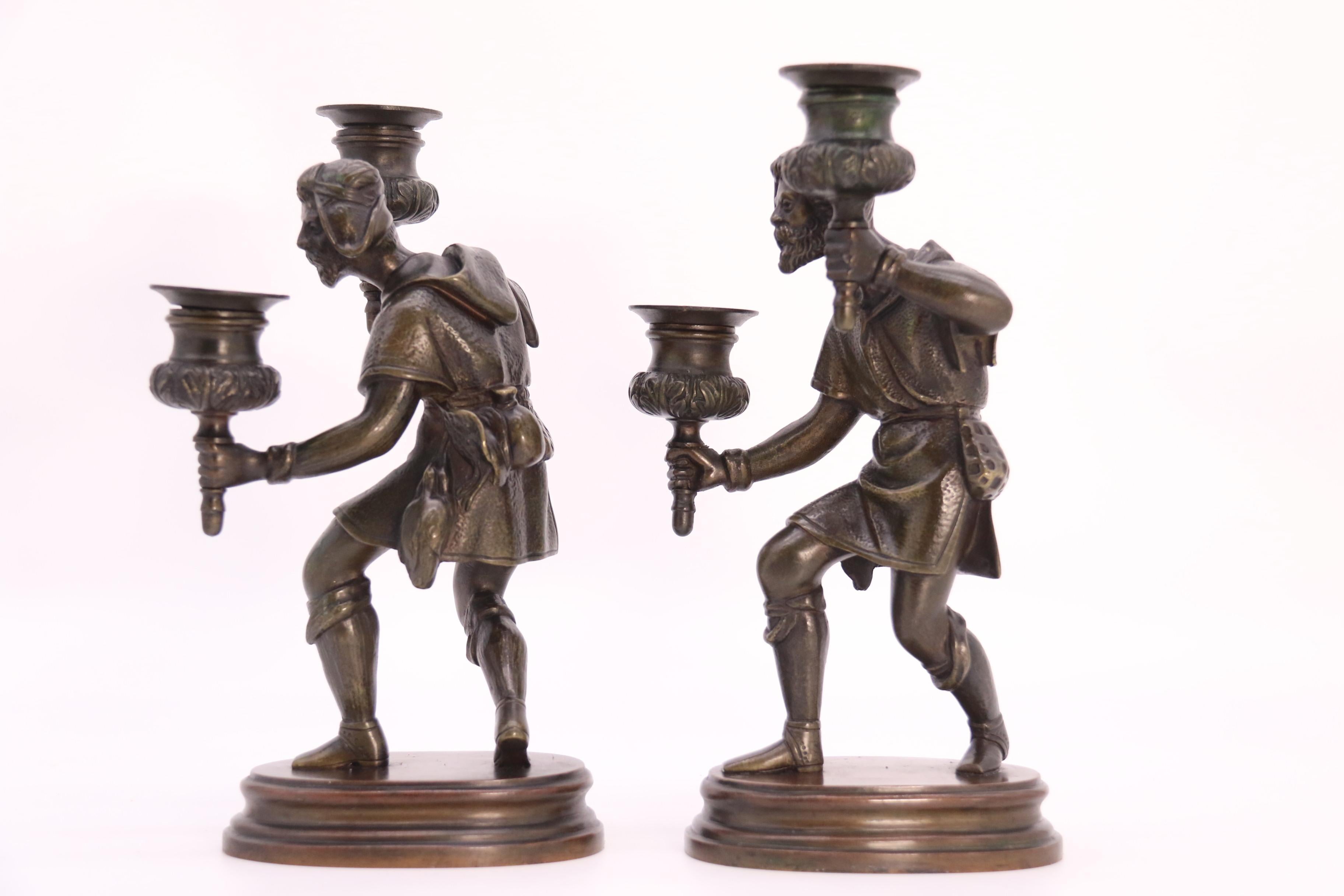 Bronze A pair of French 19th century bronze figurative double candlesticks circa 1860 For Sale